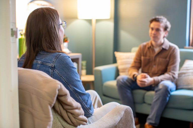 Client speaking with a therapist during an individual therapy session at Holistic Consultation in Columbus, Ohio