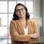 Beth Sertell, MBA, MSW, LISW-S, smiling therapist and CEO at Holistic Consultation's Columbus, Ohio location