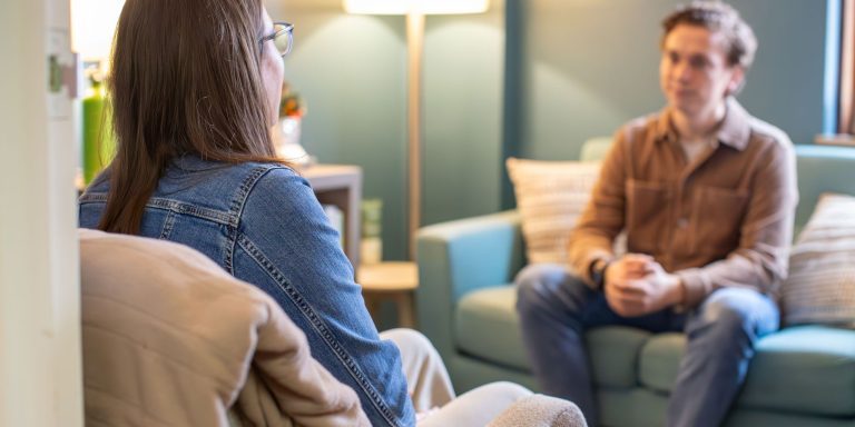 Client speaking with a therapist during an individual therapy session at Holistic Consultation in Columbus, Ohio