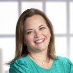 Holly Mills, MSW, LSW, smiling therapist at Holistic Consultation's Troy, Ohio location, specializing in ADHD and women's mental health