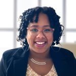Nadege Turnier, credentialing and insurance contracting specialist at Holistic Consultation, smiling in professional headshot