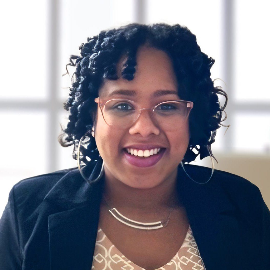 Nadege Turnier, credentialing and insurance contracting specialist at Holistic Consultation, smiling in professional headshot