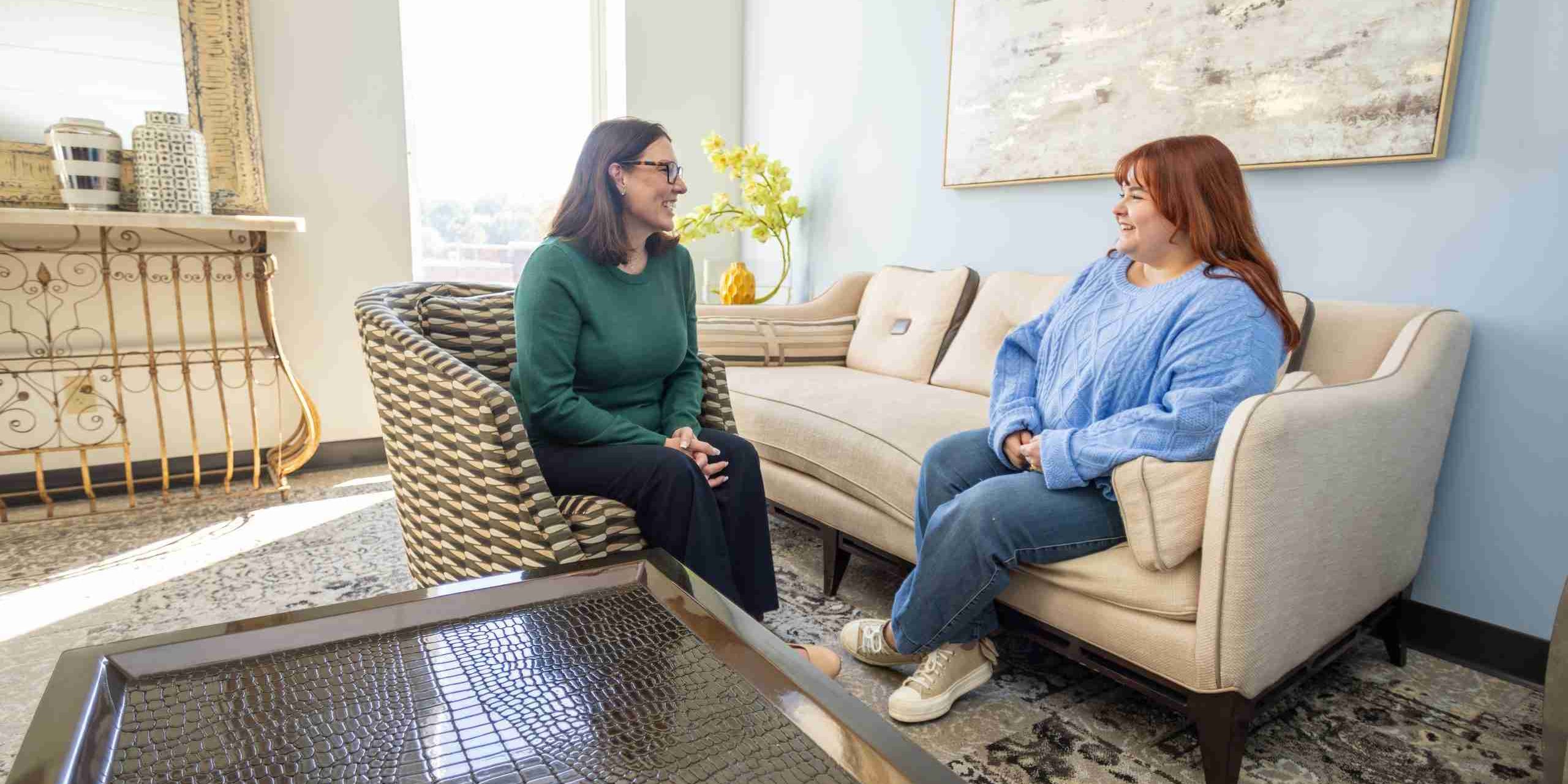 Therapist and client talking in a sunny counseling room at our North Clintonville office in Columbus, Ohio